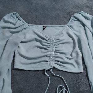 Large blue mesh off the shoulder crop top